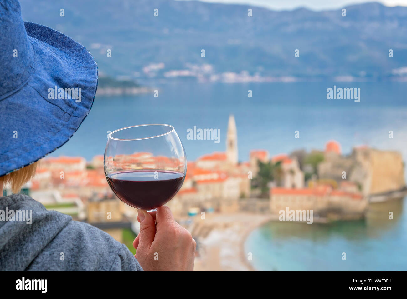 Caucasian woman drinking red wine in summer Stock Photo - Alamy