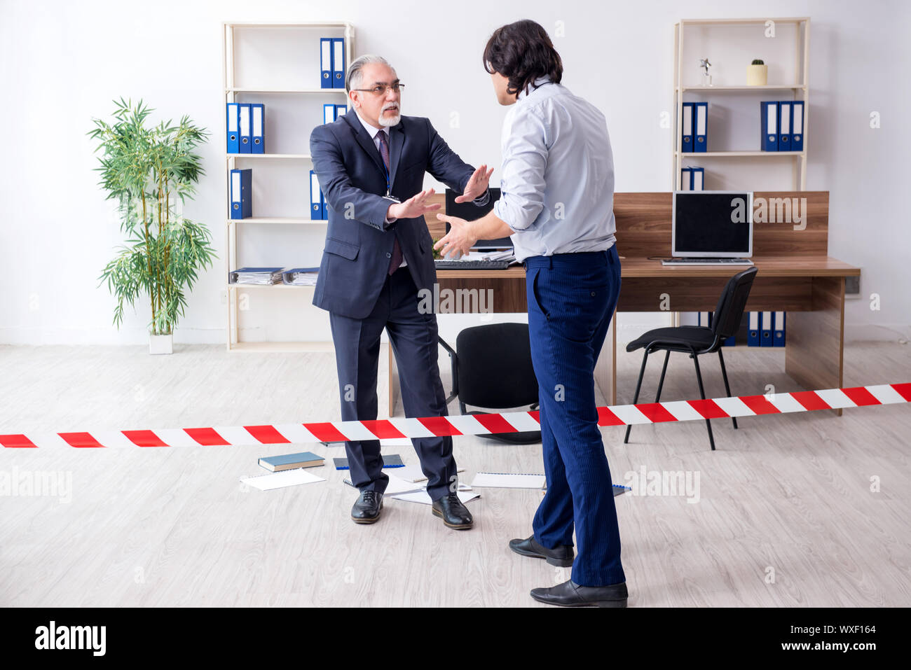 Forensic Investigator Investigating Theft In The Office Stock Photo Alamy