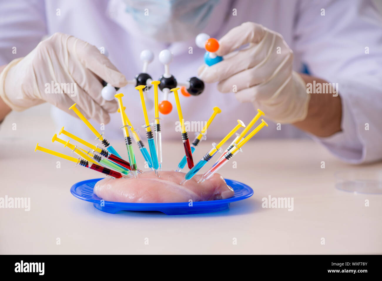 Male nutrition expert testing food products in lab Stock Photo Alamy