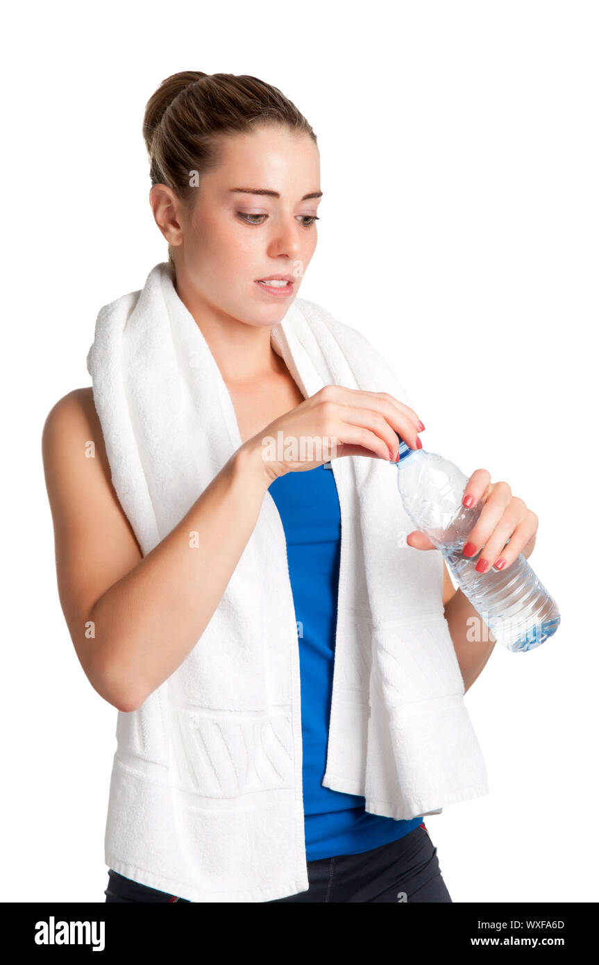 Woman about to drink water from a plastic bottle, isolated in white