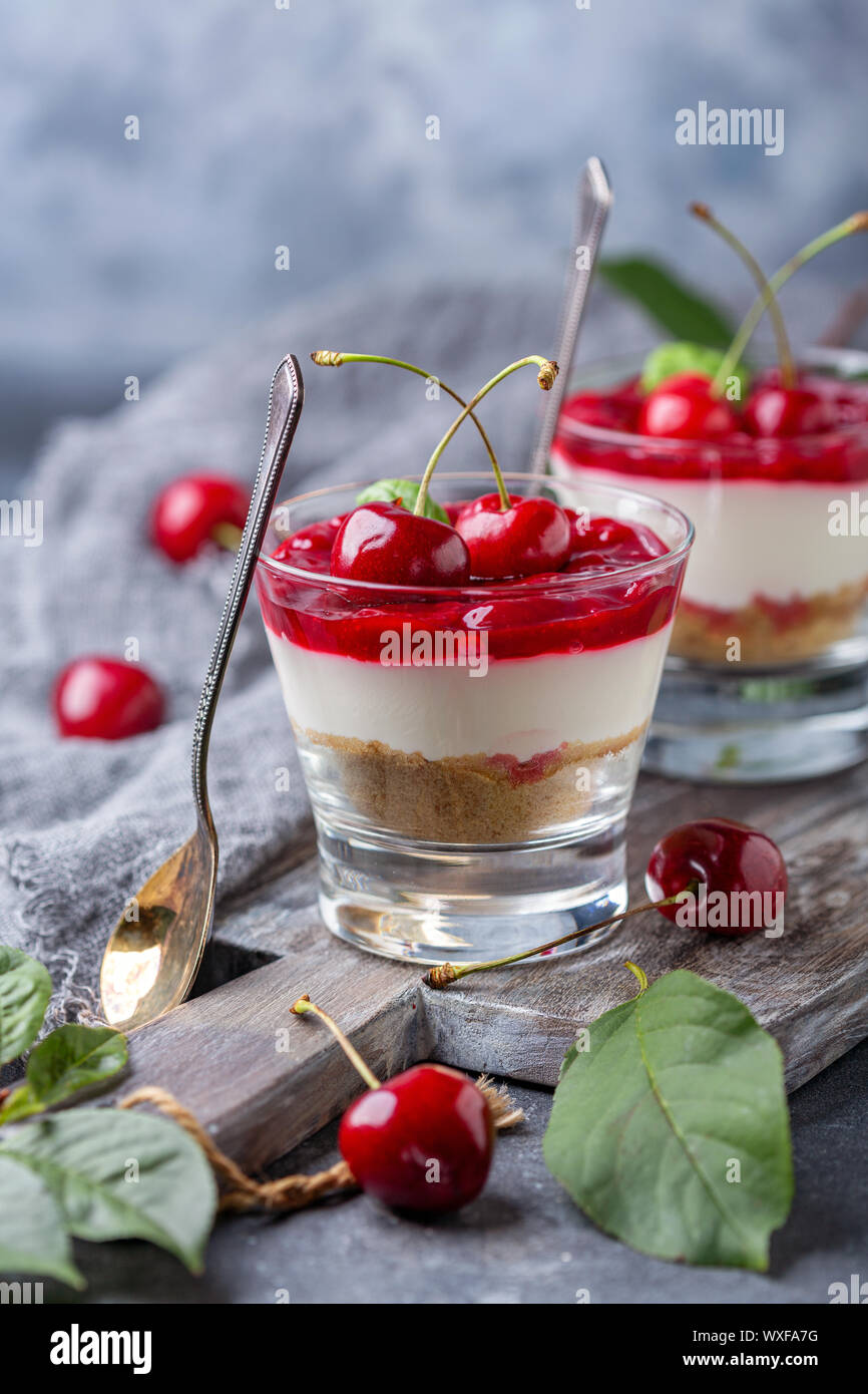 Light cheesecake with cherry jelly in a glass Stock Photo Alamy