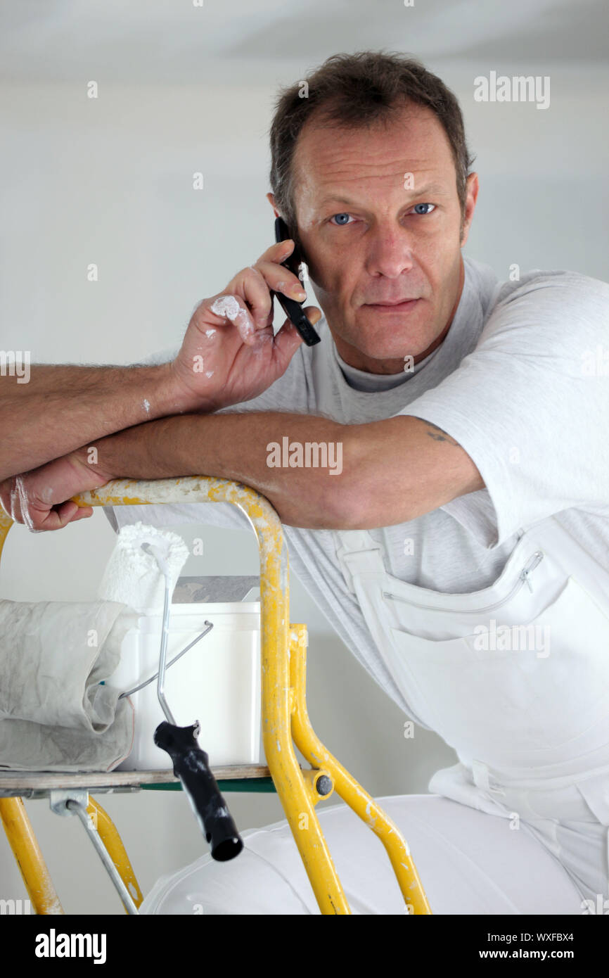 Portrait of a painter on the phone Stock Photo