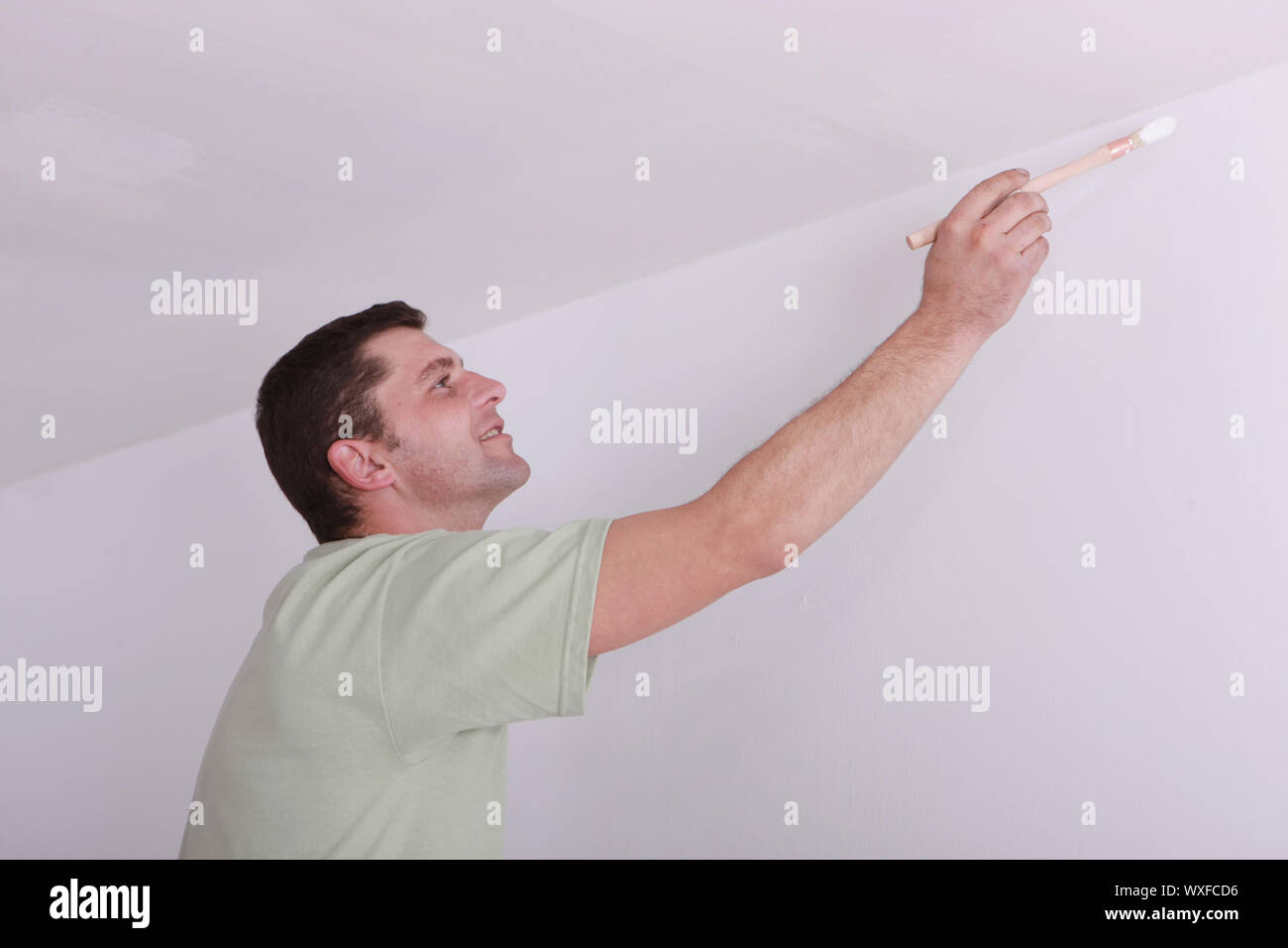 Painter Painting A Ceiling Corner Stock Photo 274475634 Alamy