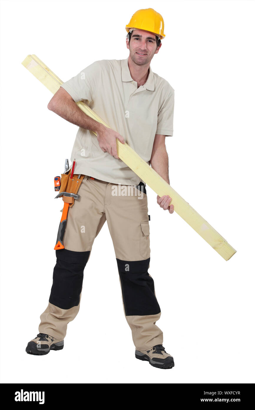 Woodworker with plank of wood Stock Photo - Alamy