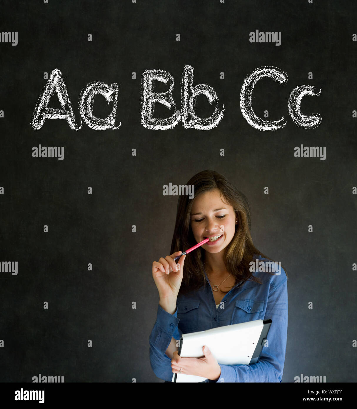 Learn alphabet write writing woman teacher on chalk blackboard ...