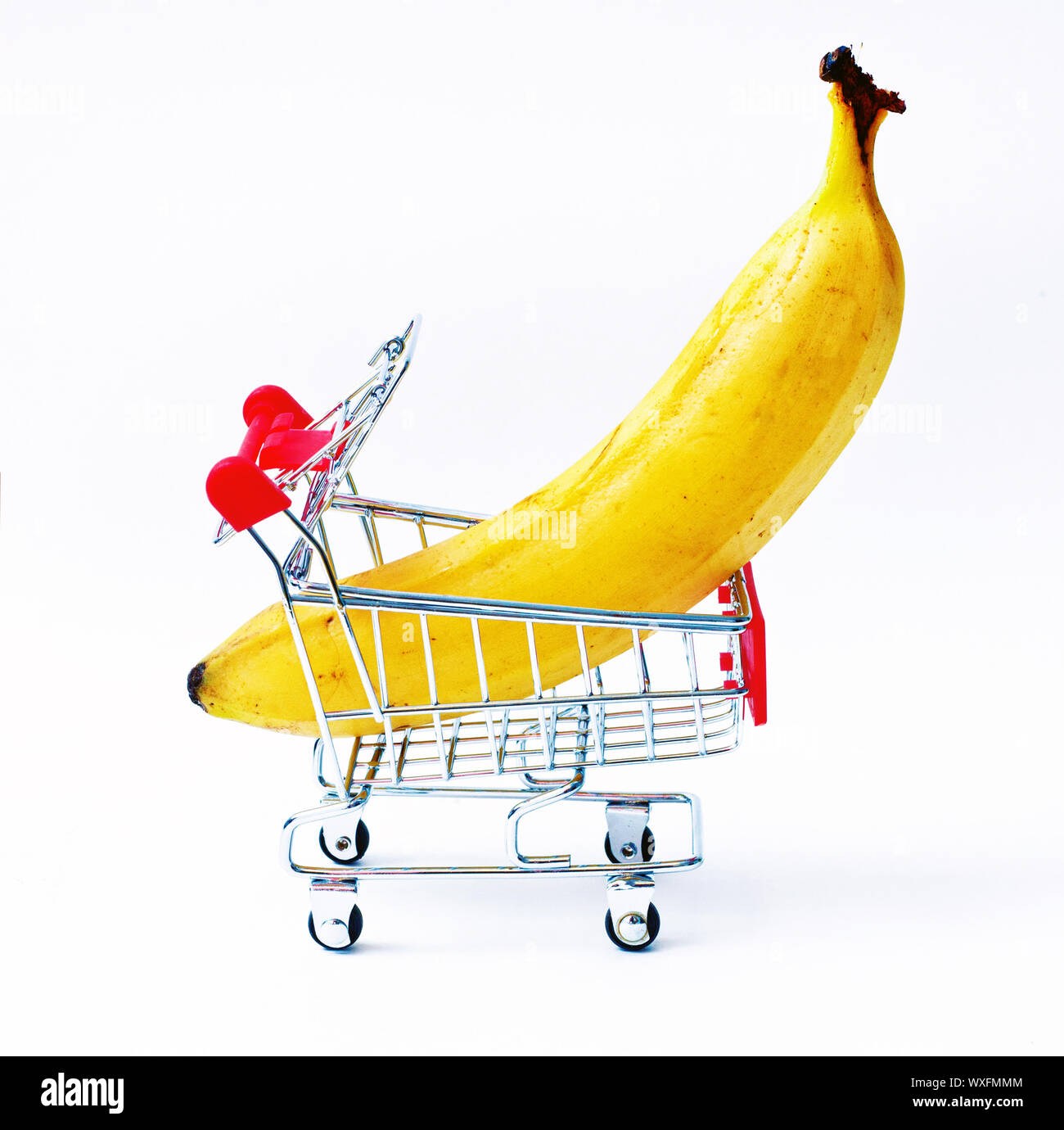 the Shopping cart with big banana Stock Photo Alamy