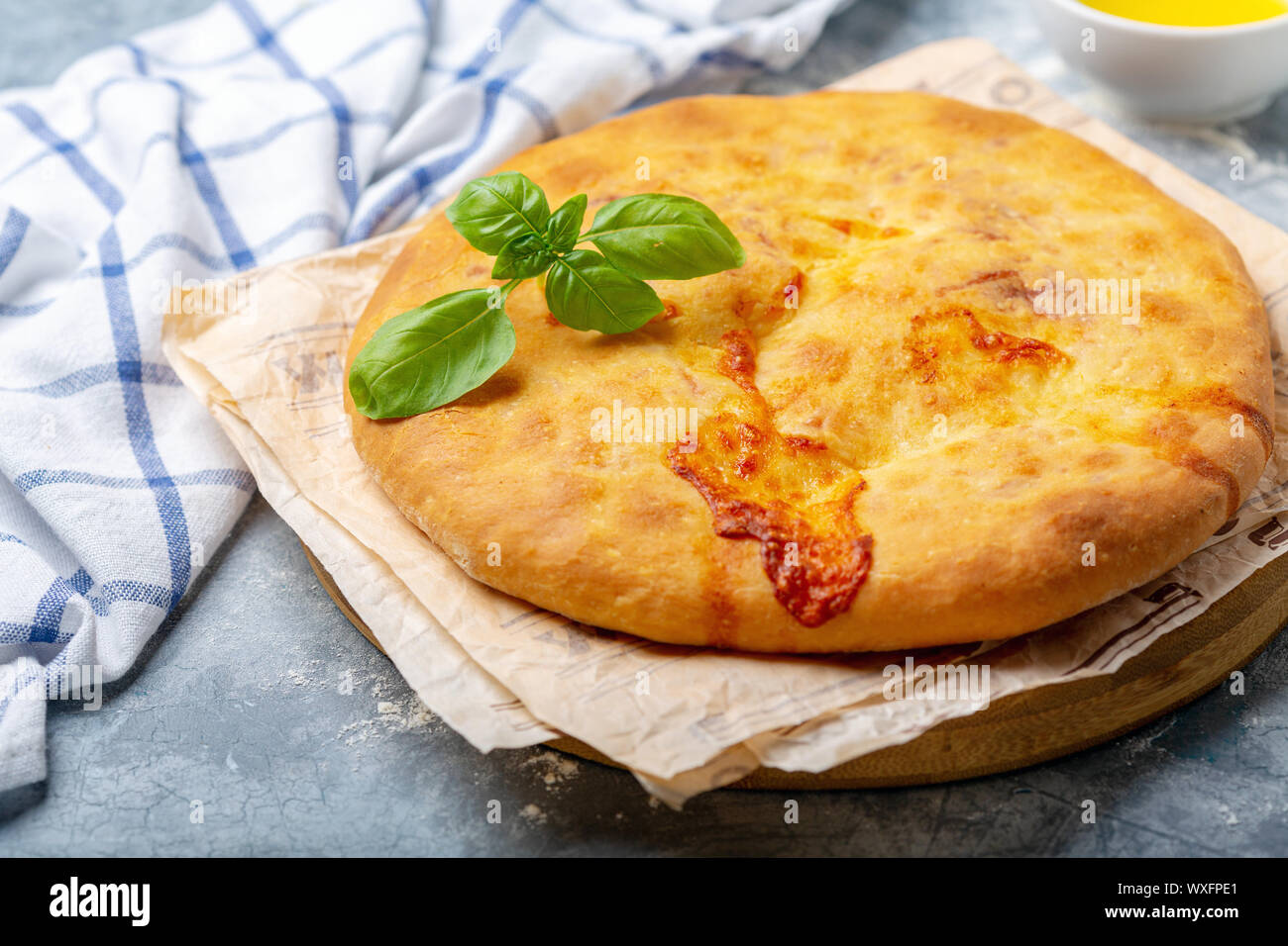 Traditional Georgian closed pie with cheese. Stock Photo