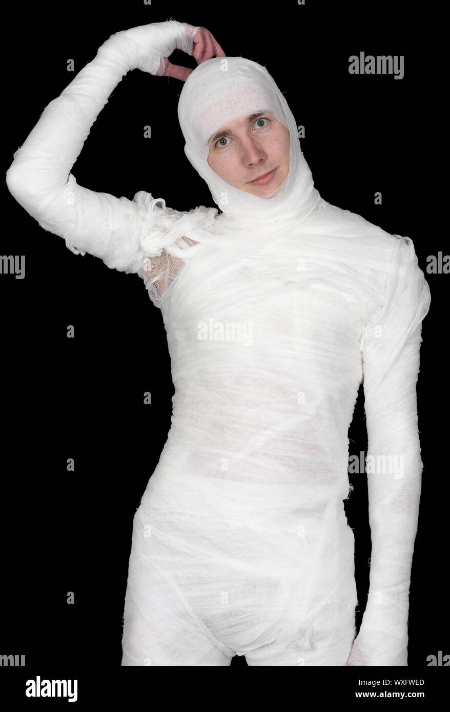 Man in bandage on the black background Stock Photo - Alamy