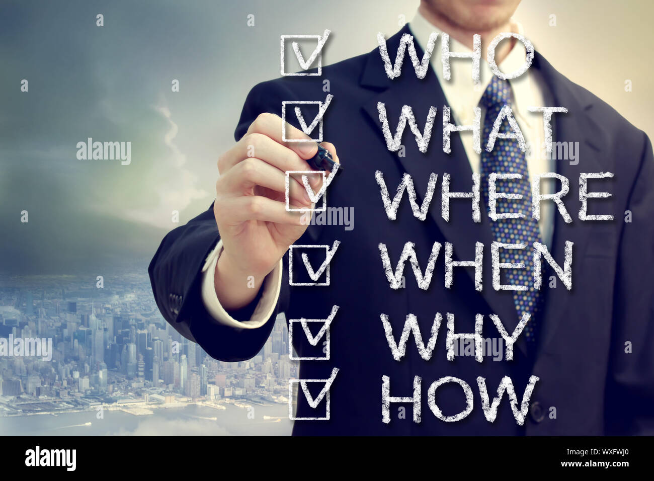 Businessman with who what where when why and how above the city Stock ...