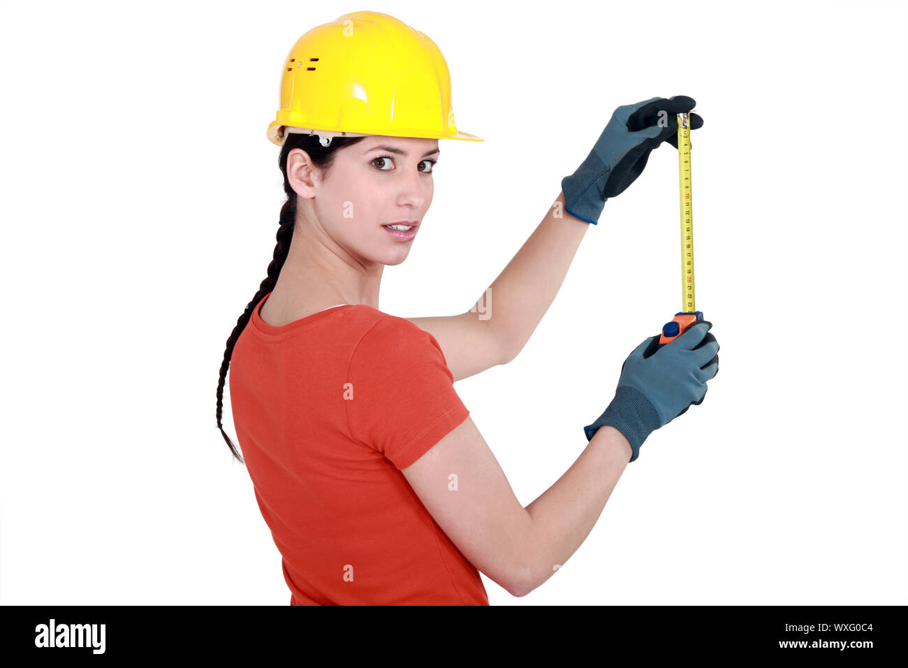 Woman in orange helmet hi-res stock photography and images - Alamy