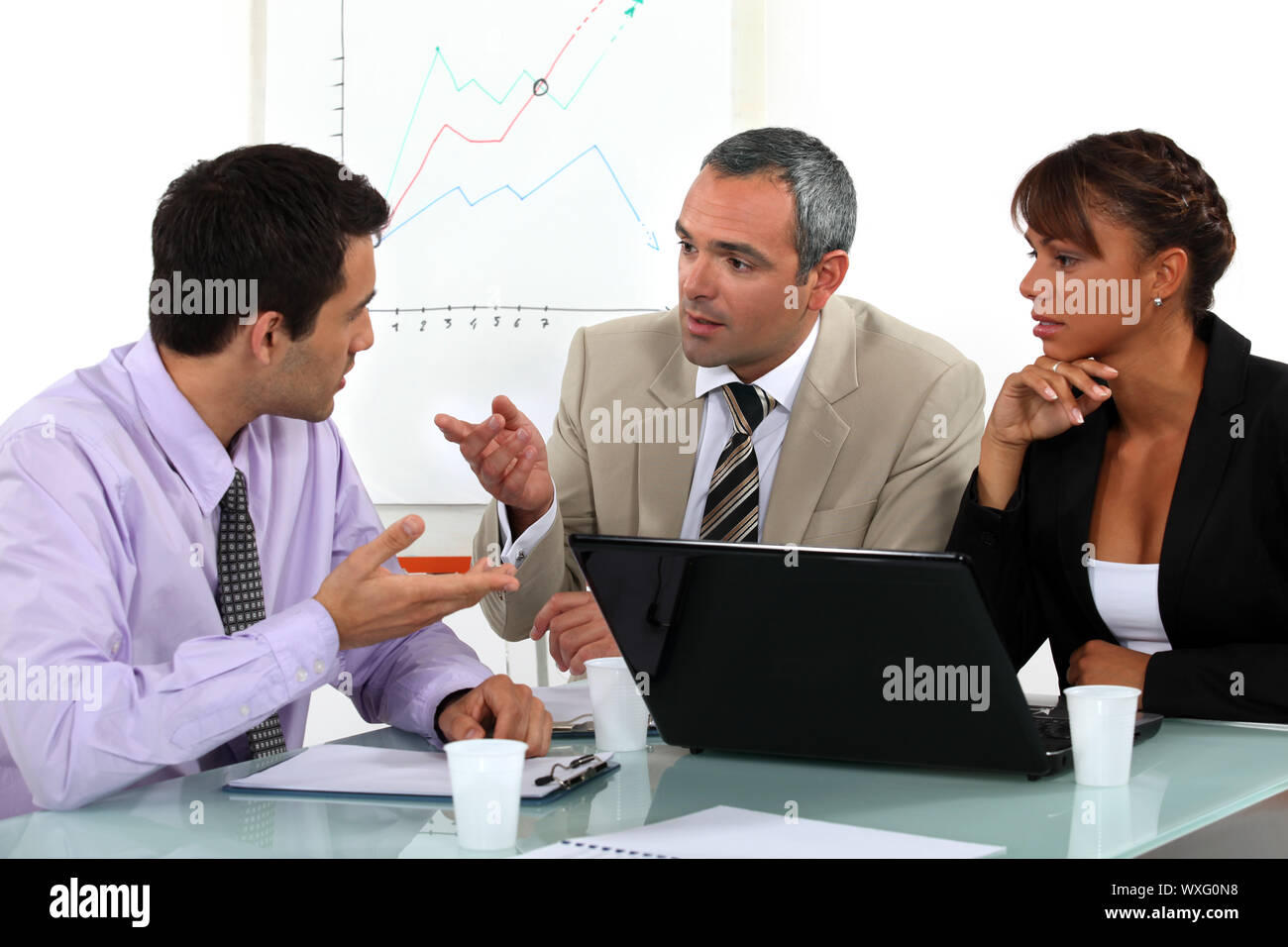 A businessteam working on a project. Stock Photo