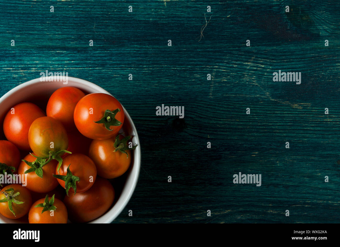 Tomatoes on the background. Tomatoes Stock Photo