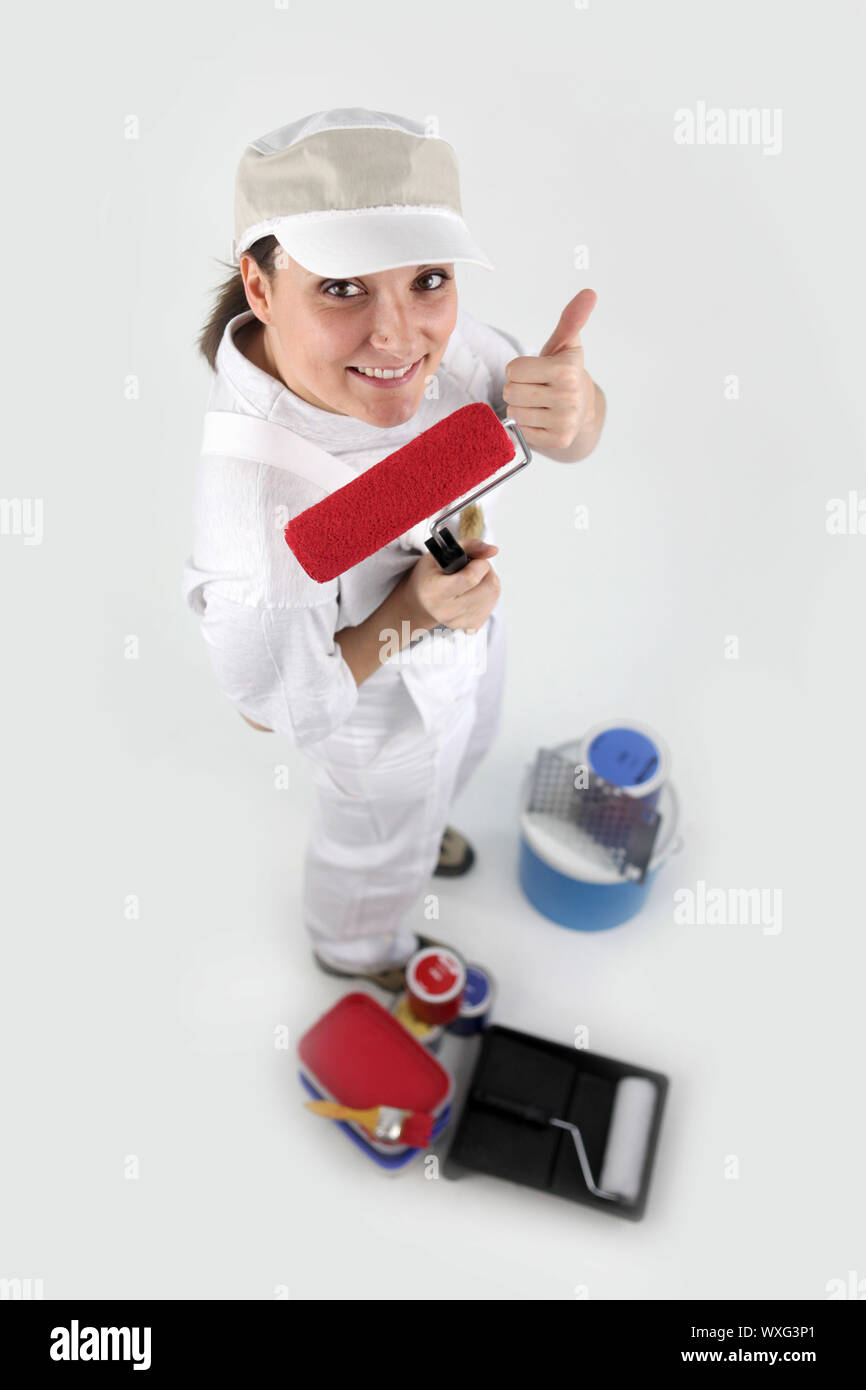 Painter with a paint roller Stock Photo