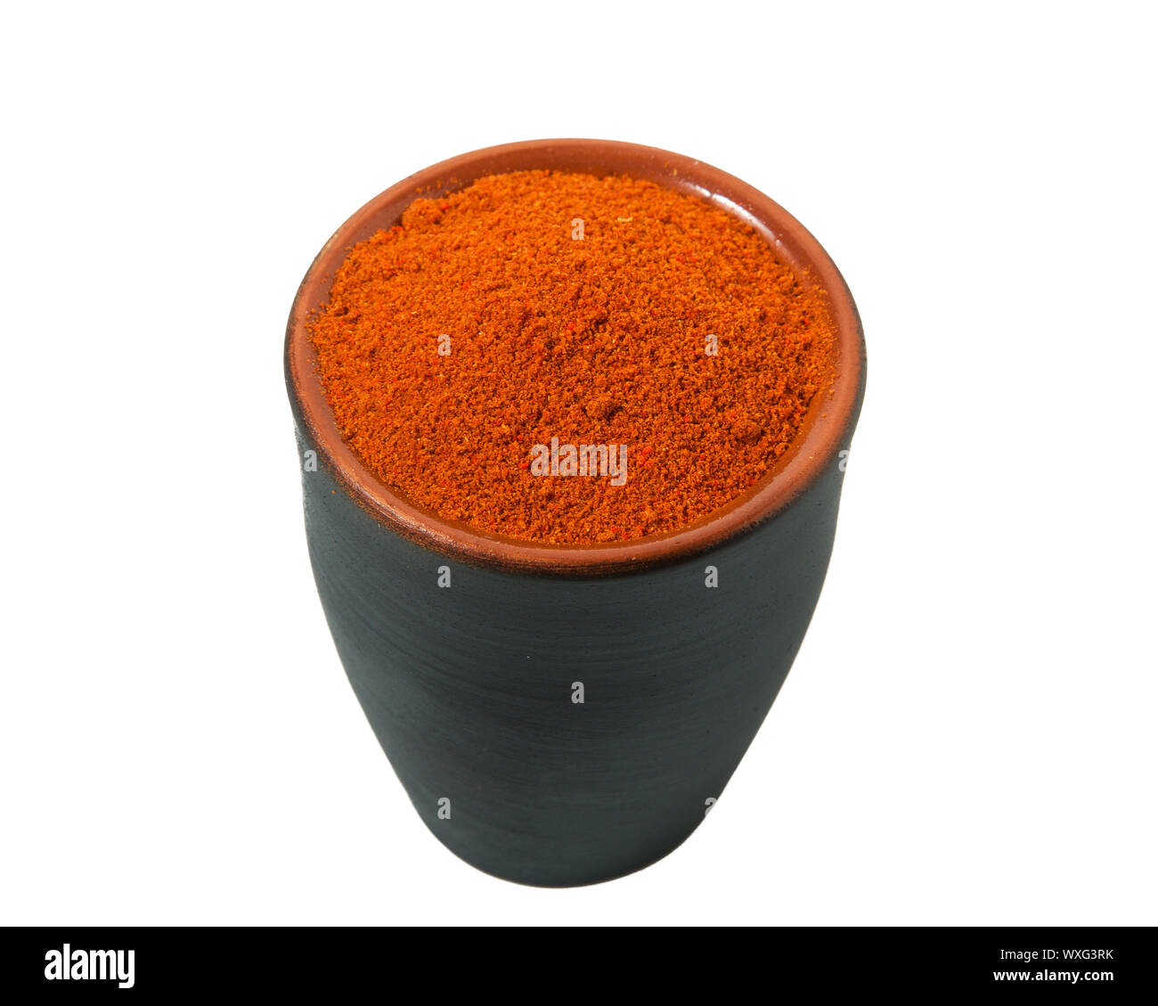 Paprika in a bowl isolated on a white background. View from above Stock