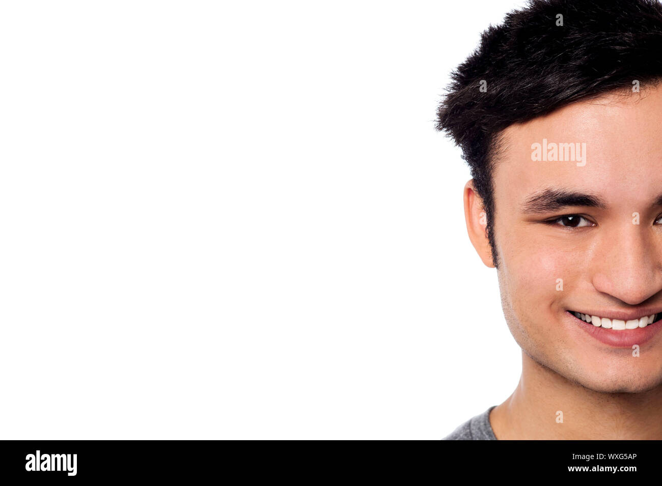 Smiling attractive man, cropped image Stock Photo