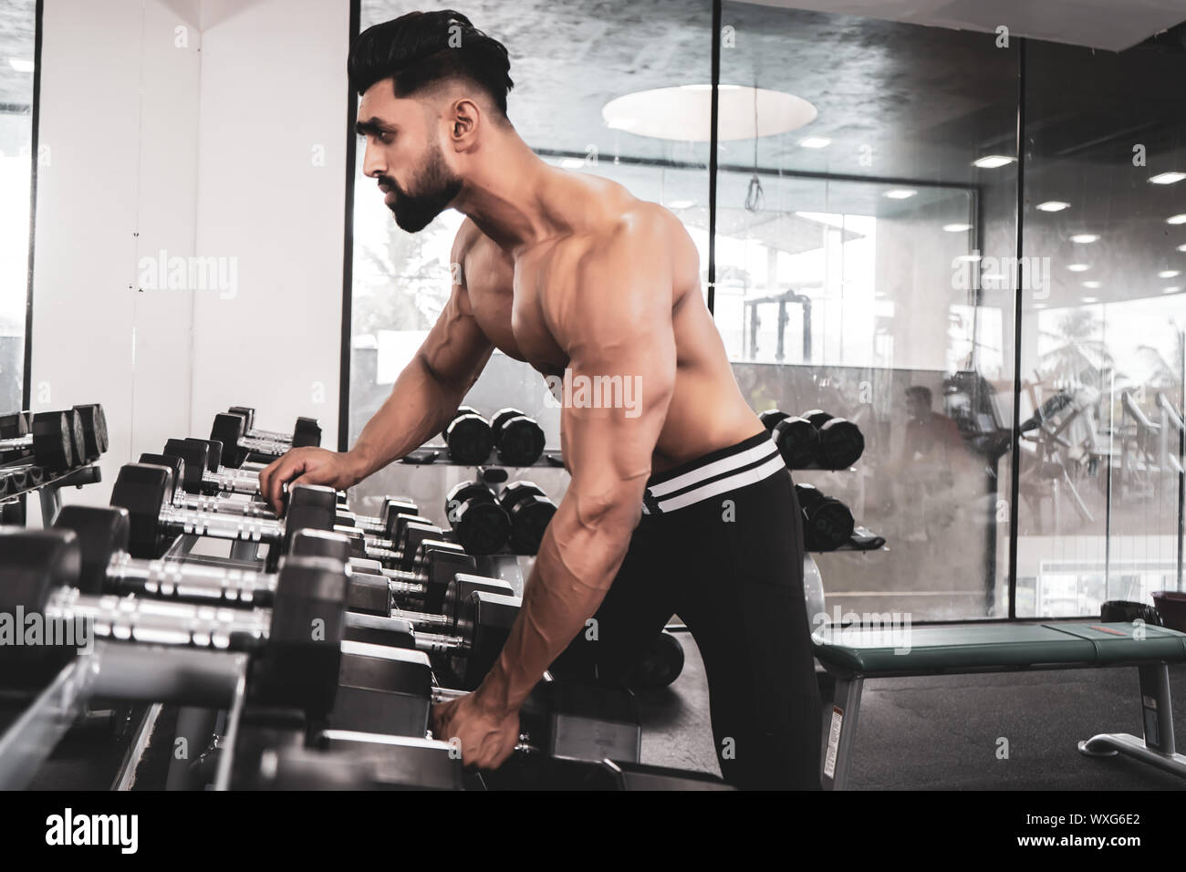 Man doing onearm row exercise for his back Stock Photo Alamy