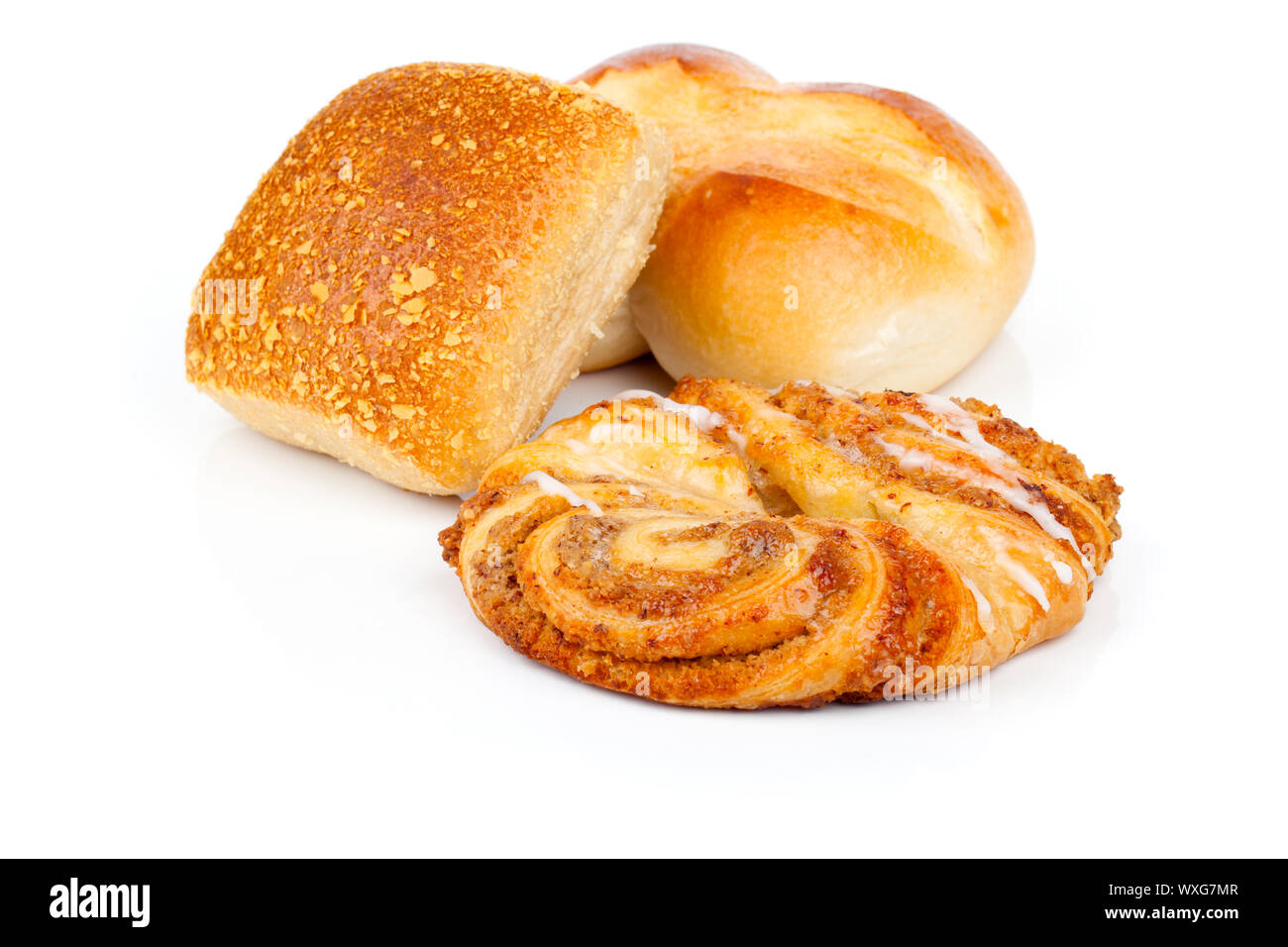 Baked bread bun and Cinnamon Rolls, isolated on white background Stock ...