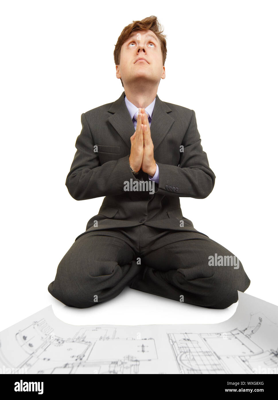 Man prays on his knees hi-res stock photography and images - Alamy