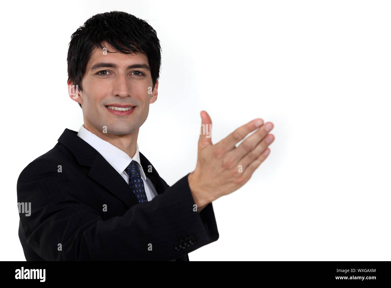 Welcoming businessman Stock Photo