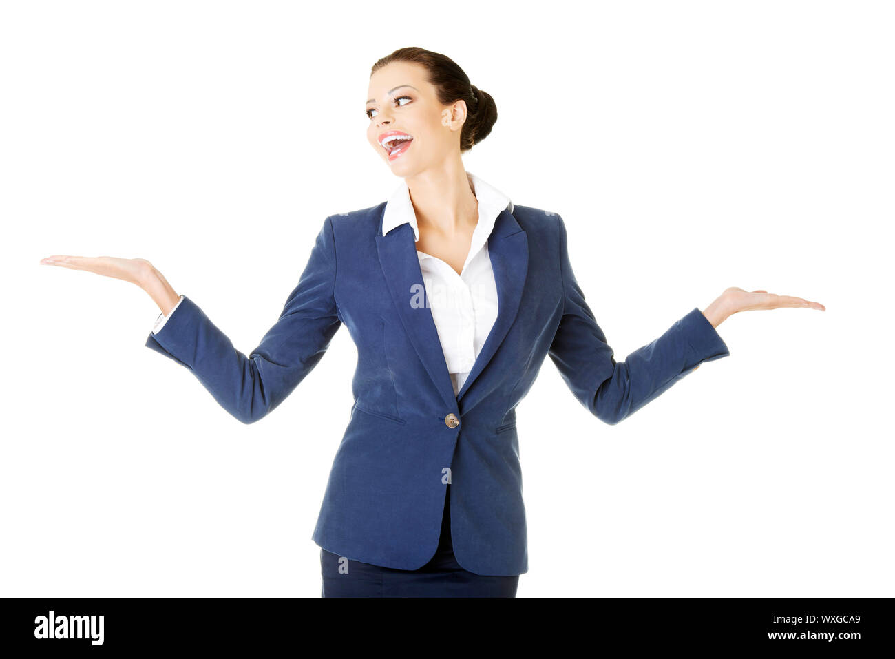 Happy young business woman showing copy space on her palm, isolated on ...