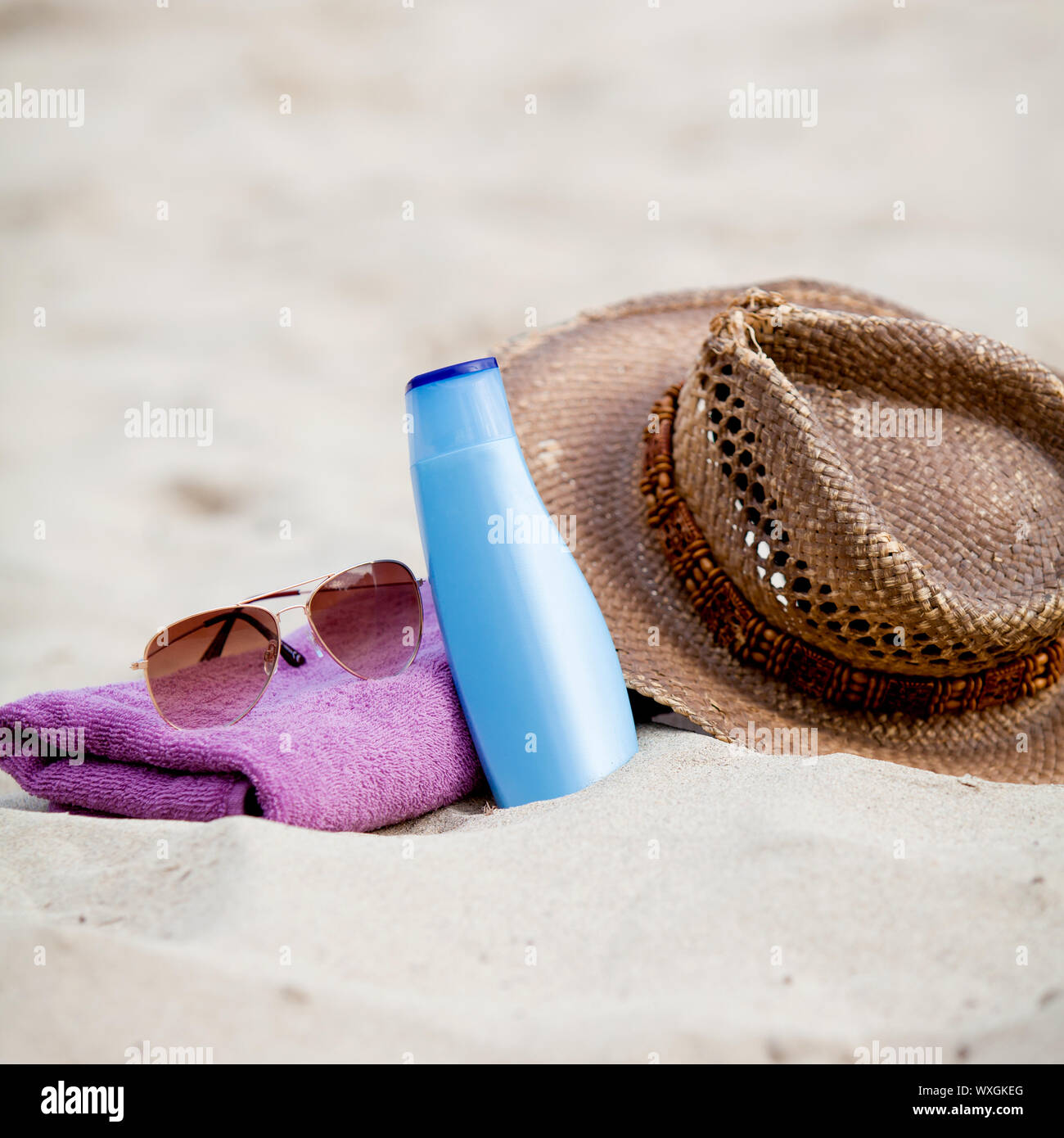 sunprotection objects on the beach in holiday Stock Photo - Alamy