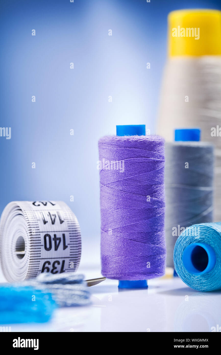 sewing threads and roll of tape Stock Photo Alamy