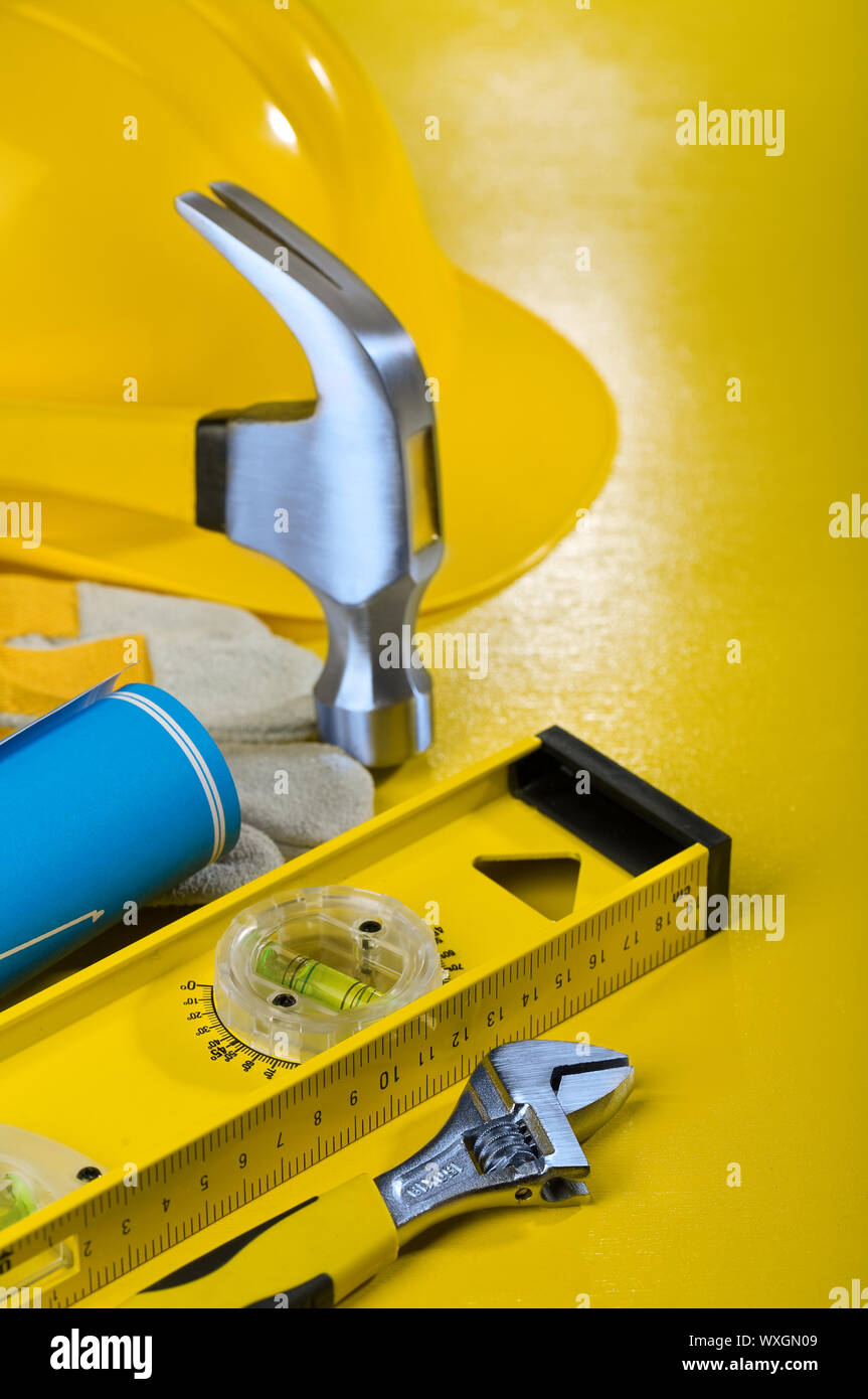 repairing tools on yellow background Stock Photo