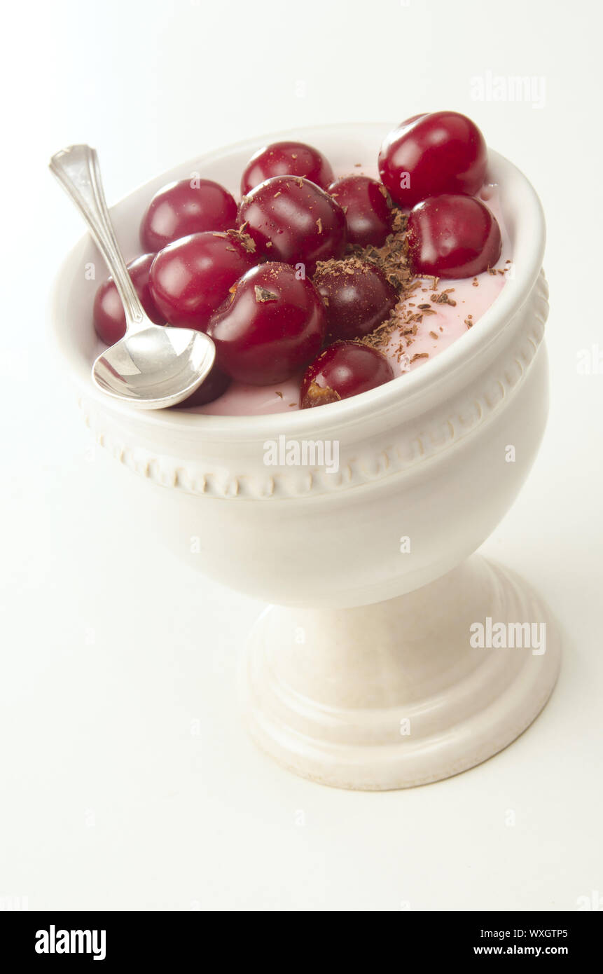 Choco Rasp fresh yogurt with cherries and chocolate rasps Stock Photo - Alamy