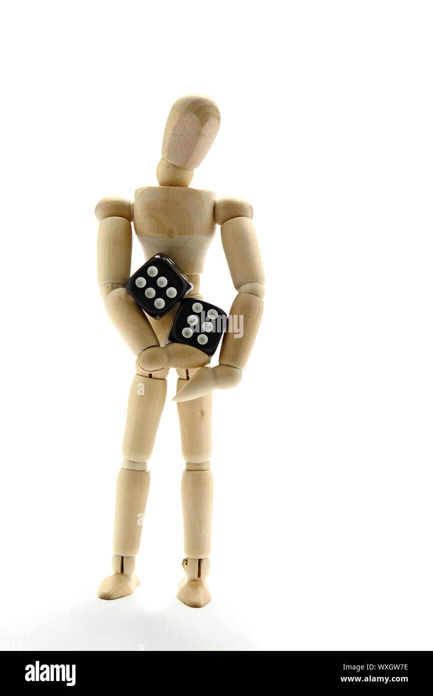 Puppet and dice Stock Photo