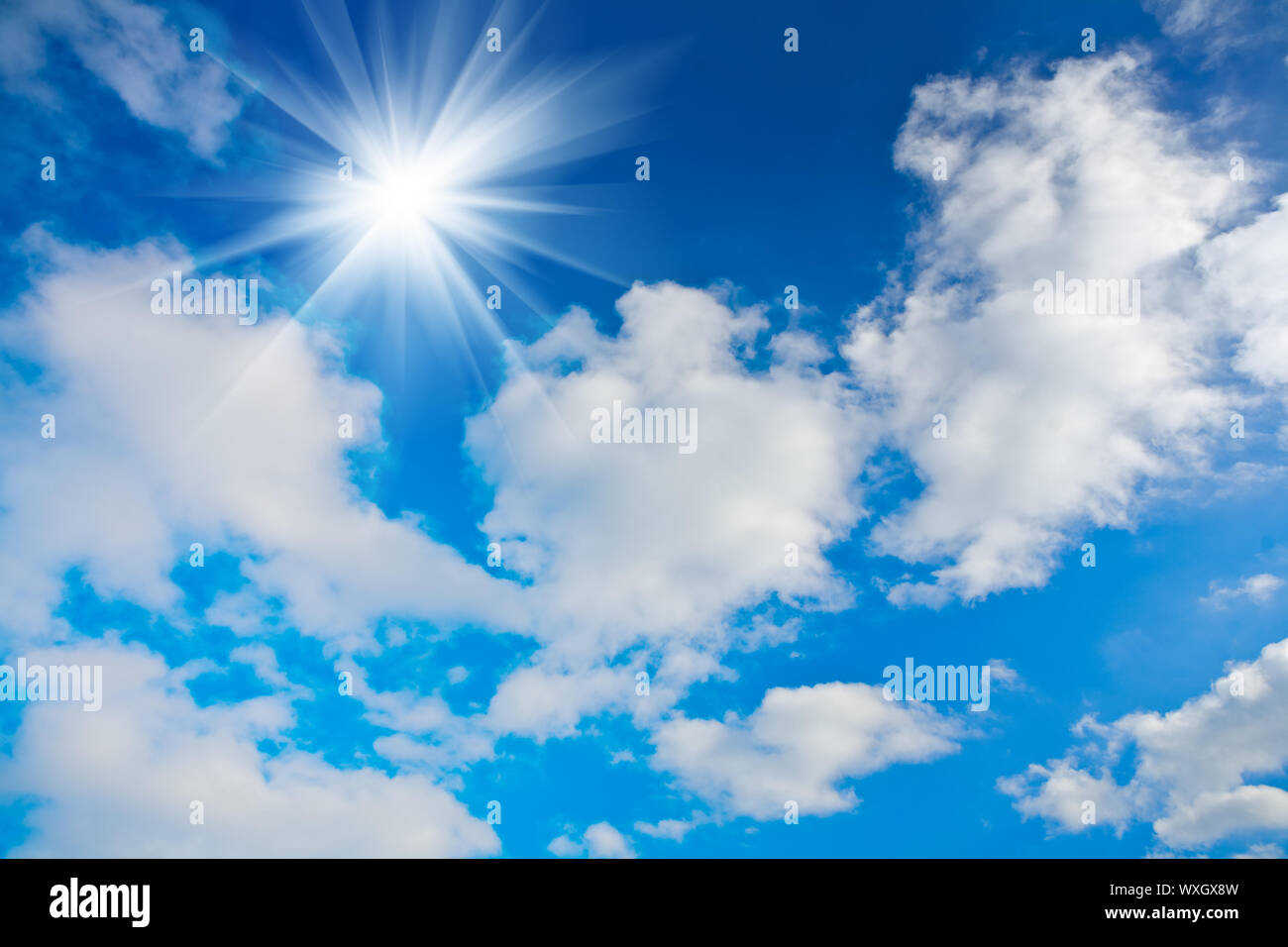 beautiful cloudy blue sky close up wiyh sun Stock Photo - Alamy