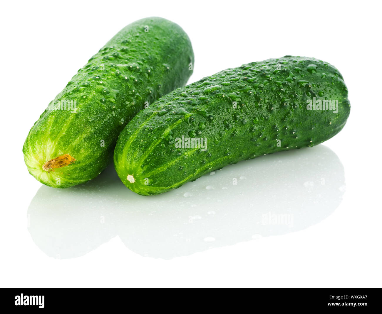 fresh dropped cucumbers Stock Photo
