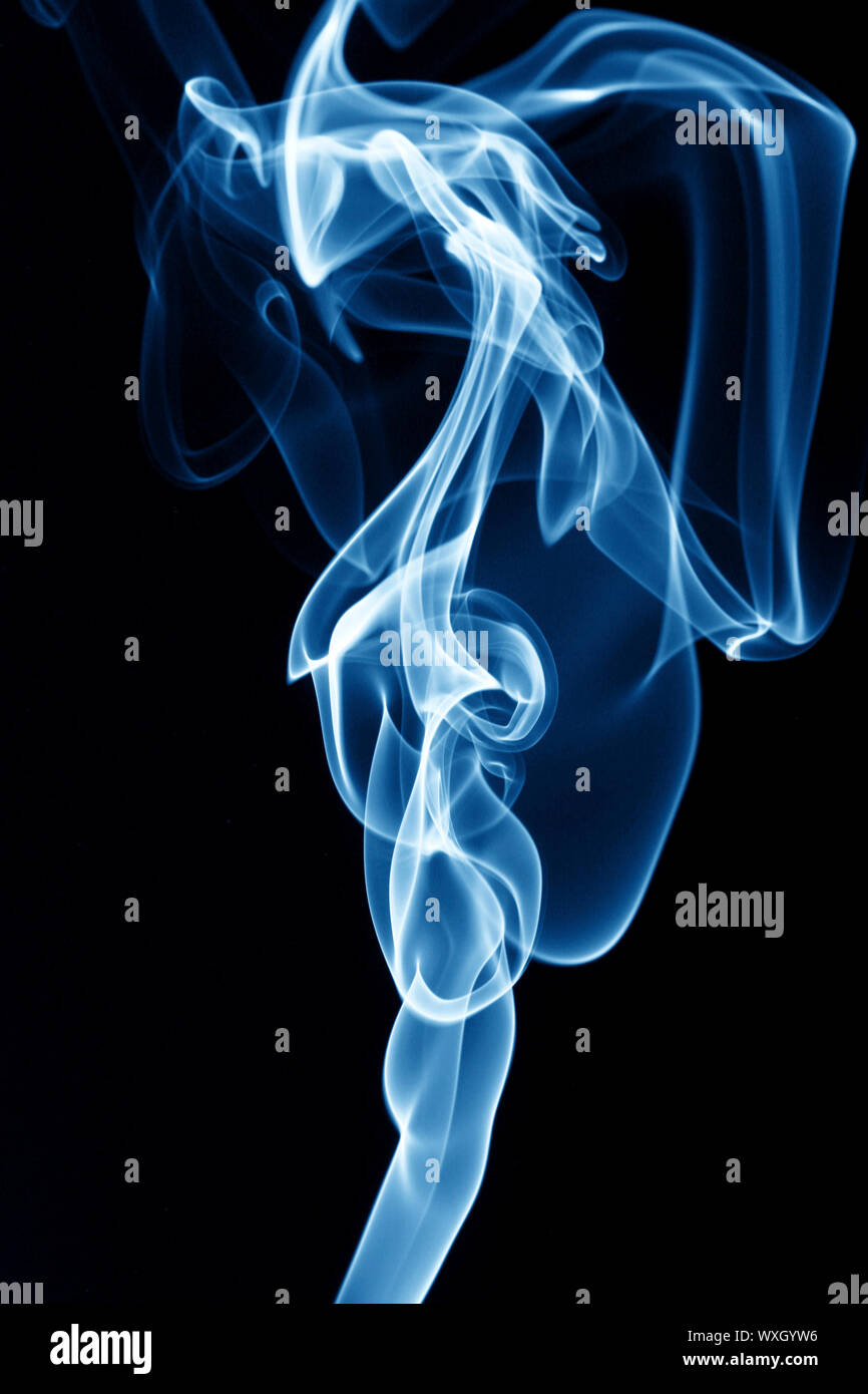 blue smoke on black background Stock Photo - Alamy