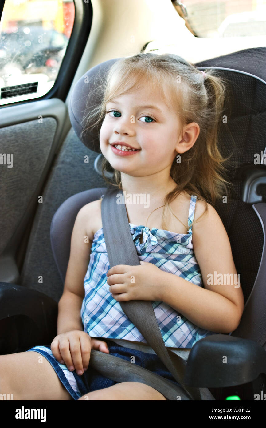 Child in a car seat Stock Photo Alamy