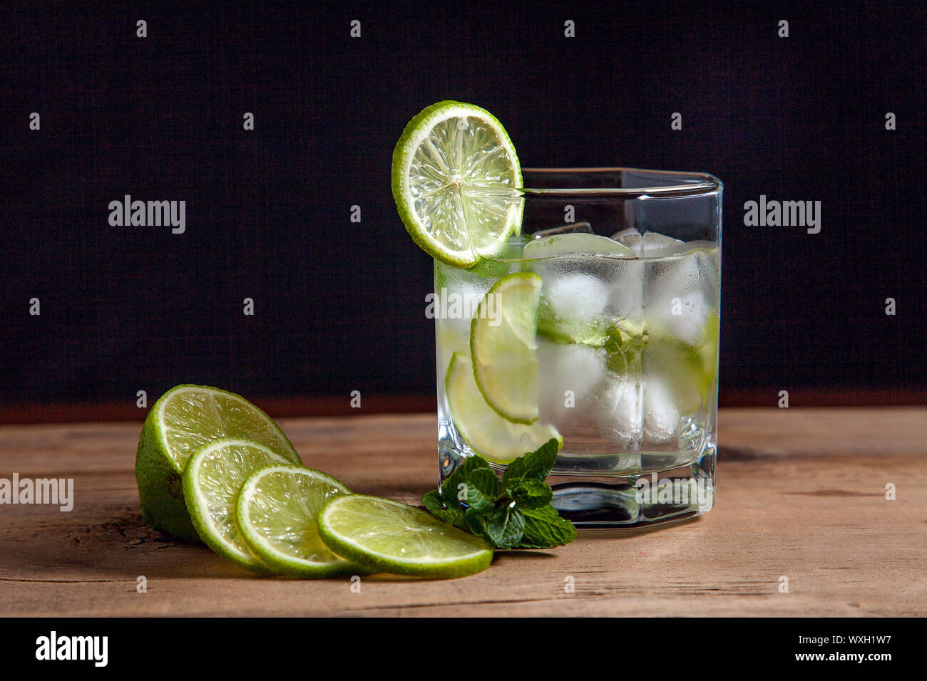 Mojito summer beach refreshing tropical cocktail in glass soda water