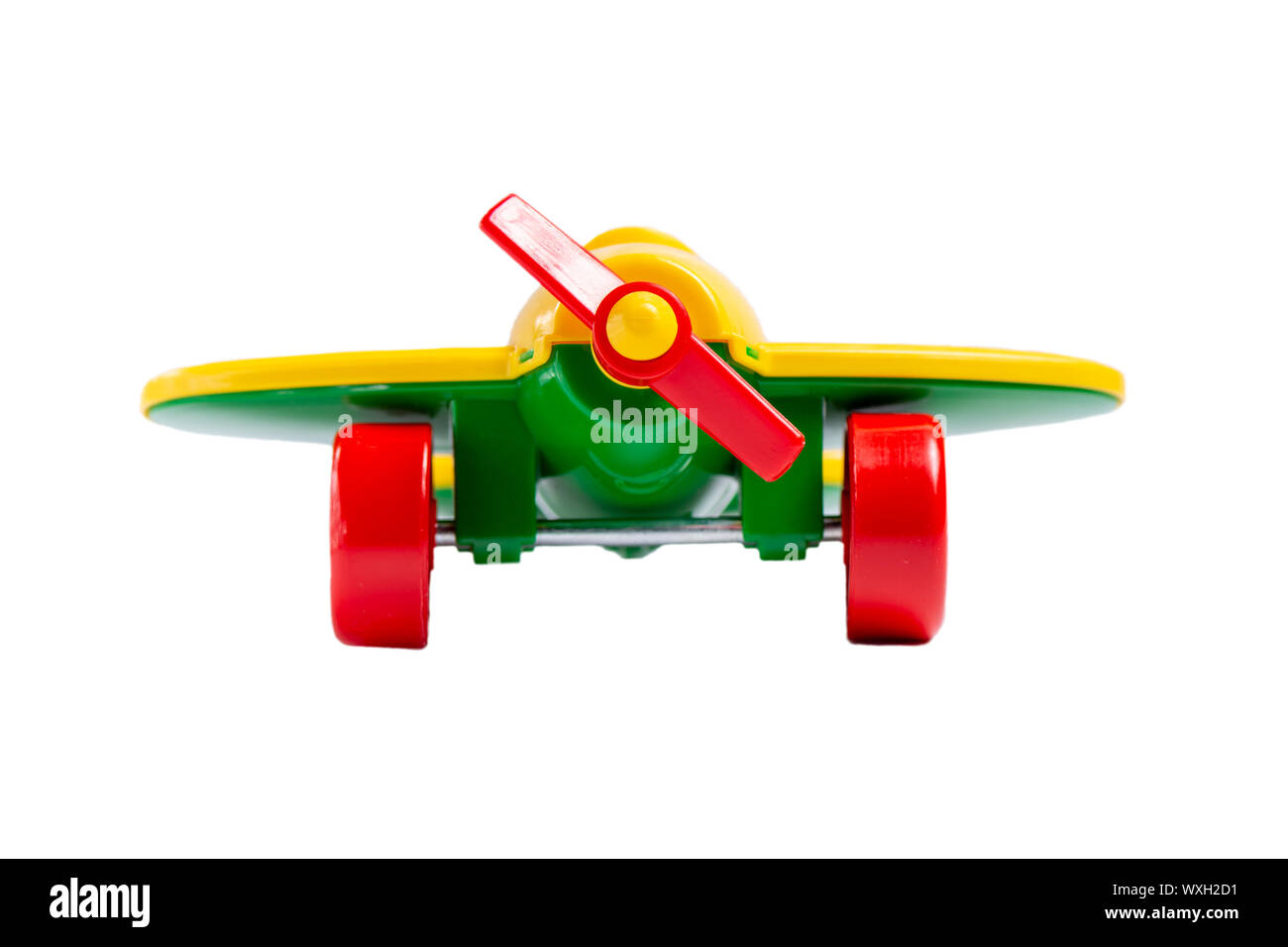 yellow toy airplane with propeller and landing gear isolate on a white  background without shadow. concept of travel and flight Stock Photo - Alamy