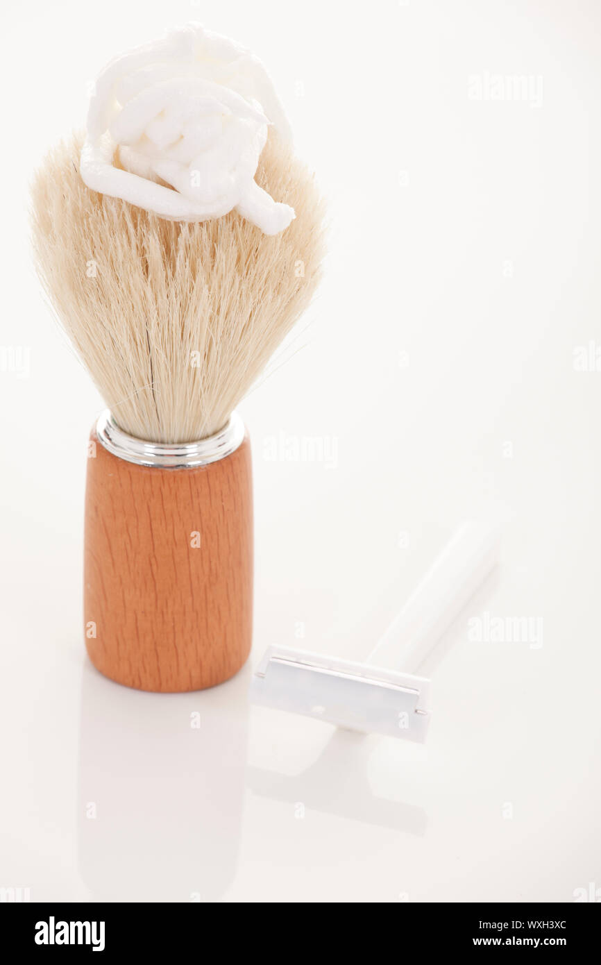 Retro badger shaving brush with a dollop of shaving cream Stock Photo