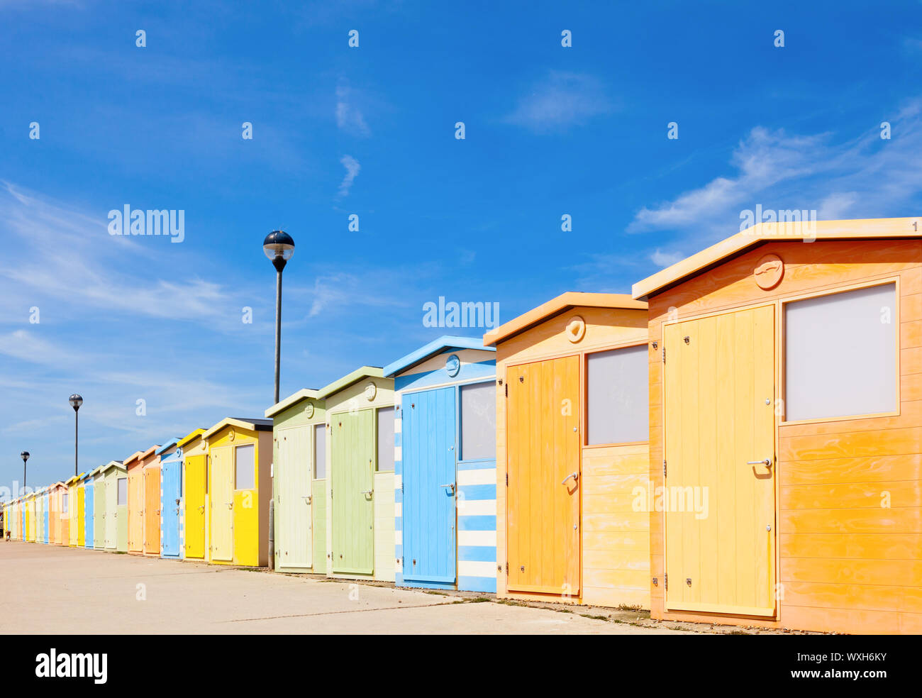 Colourful beach cabins in England Stock Photo