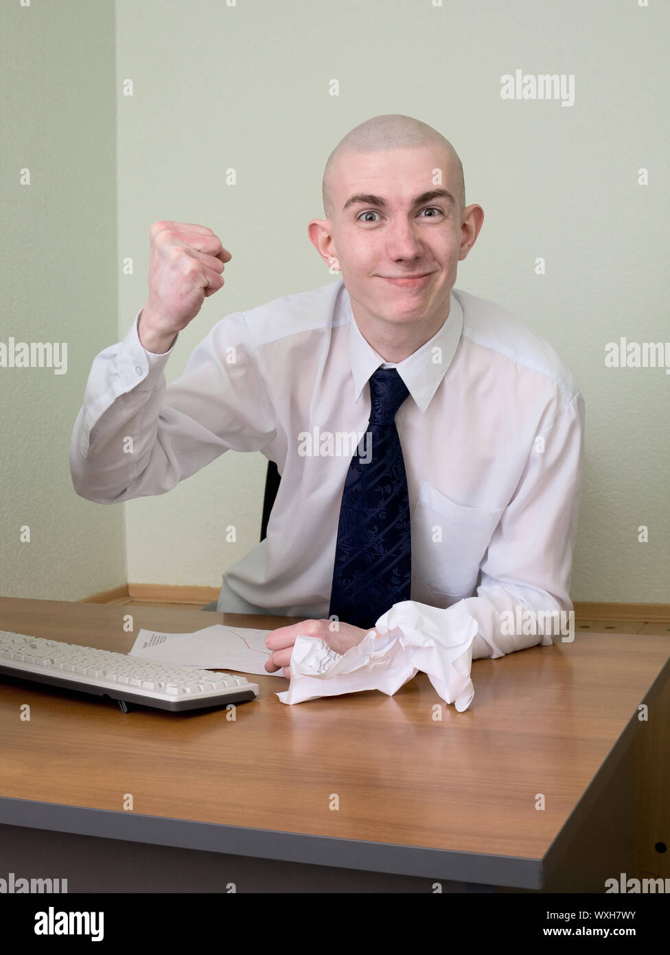 Emotional manager at office on a workplace Stock Photo