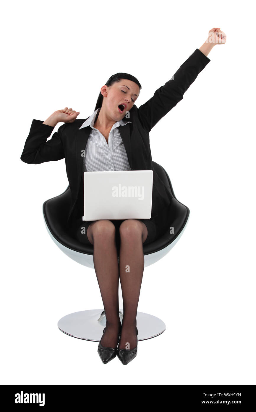 Businesswoman yawning Stock Photo