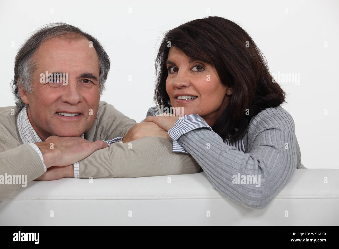 Couple middle age sofa talking hi-res stock photography and images - Alamy