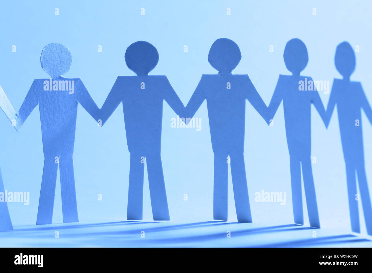paper team linked together partnership concept Stock Photo Alamy