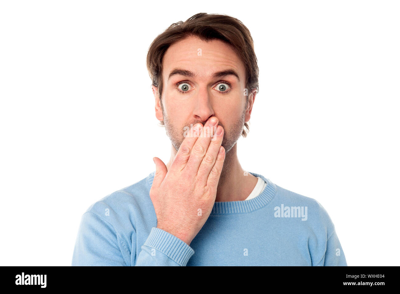 Amazed young man isolated on the white background Stock Photo - Alamy