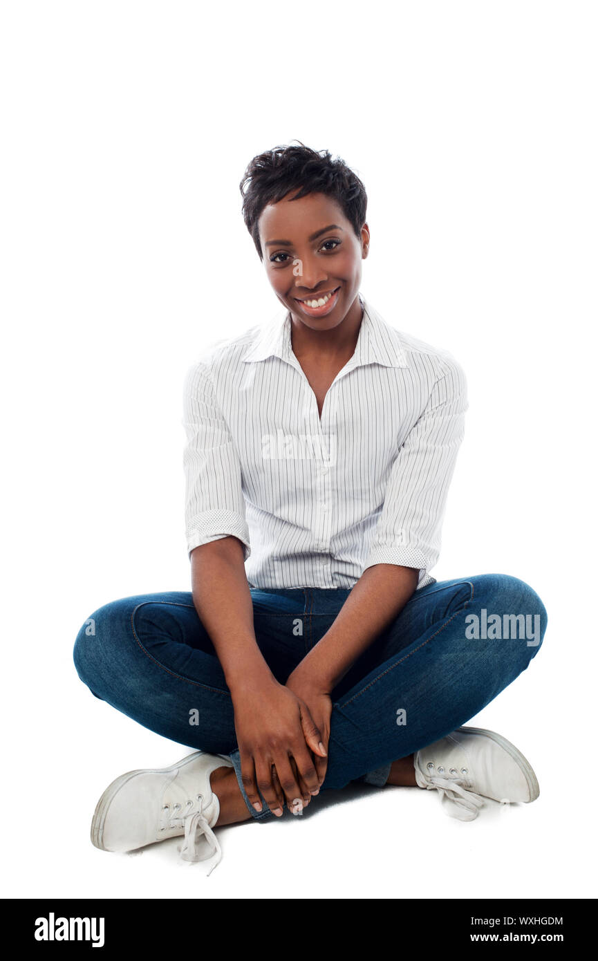 Smiling african woman dressed in casuals Stock Photo - Alamy
