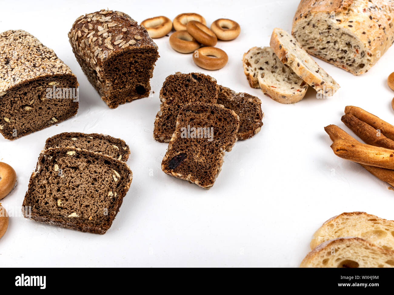 Different types of bread on a white background. Stock Photo