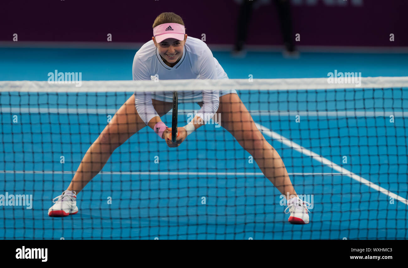 Veronika Kudermetova of Russia & Jelena Ostapenko of Latvia in action