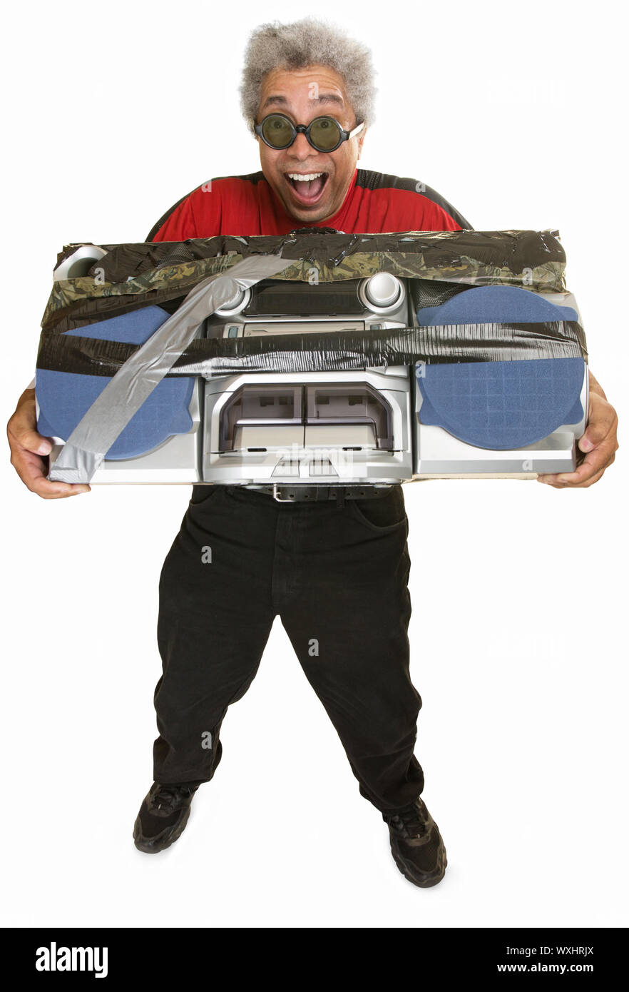 Giddy middle aged man carrying taped boom box Stock Photo