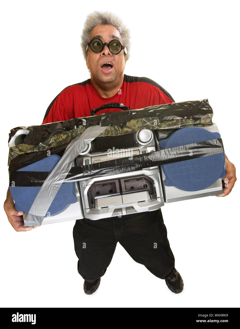 Exhausted Hispanic man with heavy portable radio Stock Photo