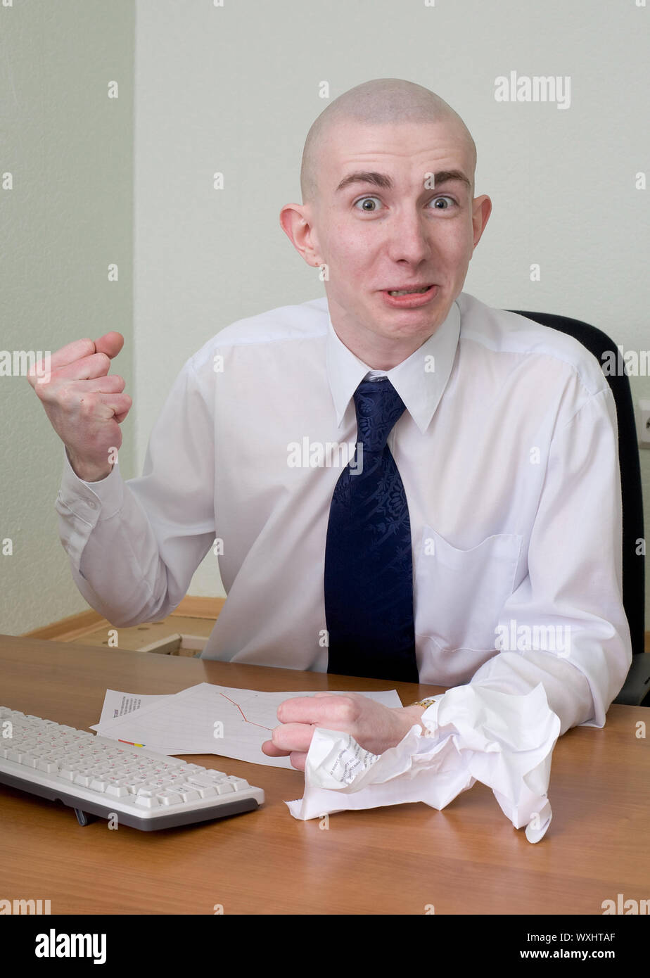 Emotional manager at office on a workplace Stock Photo