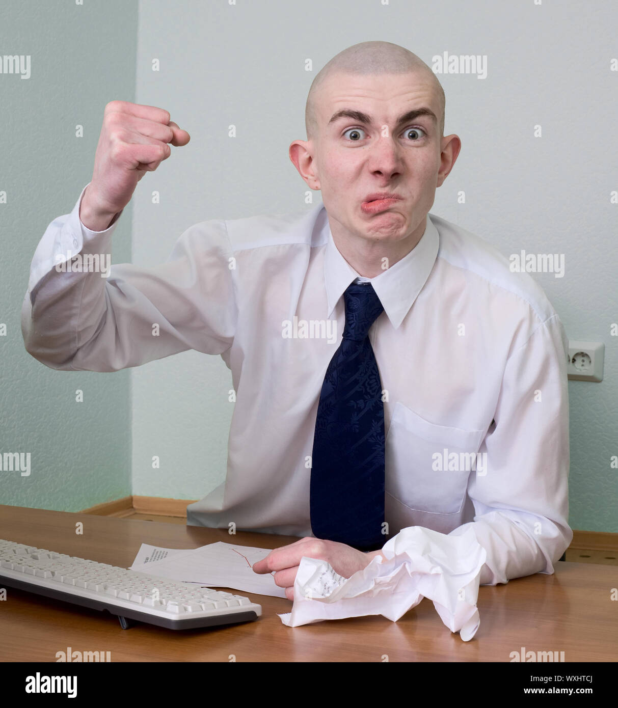 Emotional manager at office on a workplace Stock Photo