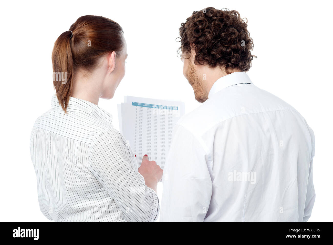 Executives analyzing report and discussing Stock Photo